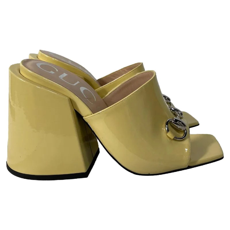 Sleek and Shiny Patent Pump Heels for a Polished Look--Gucci Lexi Horsebit Chunky Heeled Mules in Yellow Patent Leather