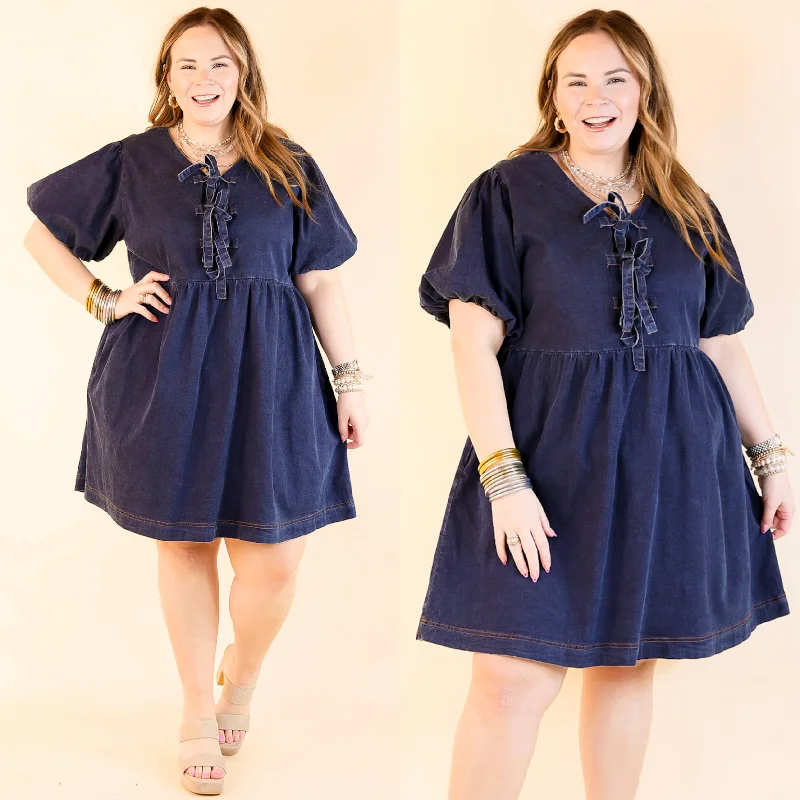 Denim dress with asymmetrical hem design--Timeless Trend Short Sleeve Denim Dress with Bows in Medium Wash