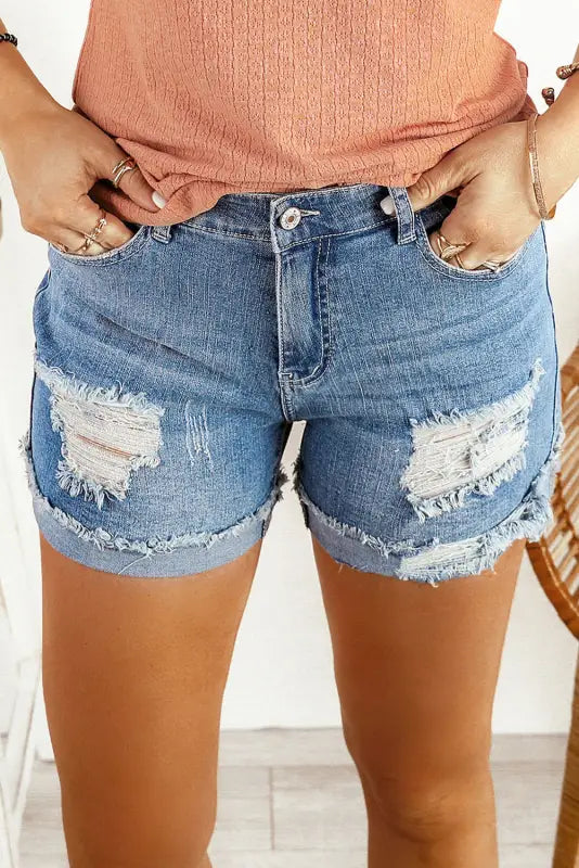 Women's denim shorts and a graphic hoodie-Distressed Ripped Denim Shorts - Rolled Hem Women's denim shorts and a graphic hoodie-Distressed Ripped Denim Shorts - Rolled Hem