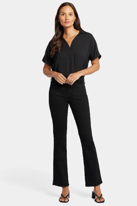 To great jeans stylist in 2025.Barbara Bootcut Jeans In Short Inseam - Black