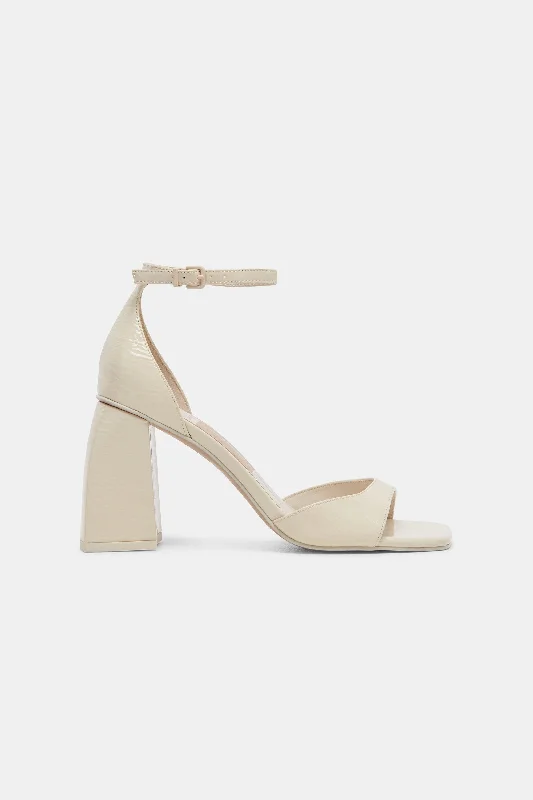 Versatile Heeled Sandals for Any Occasion---Dolce Vita Janey Heels in Ivory Crinkle Patent